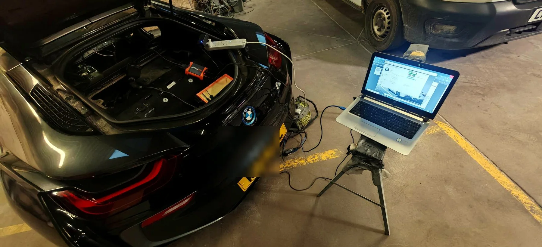 Mobile ECU programming equipment on a BMW